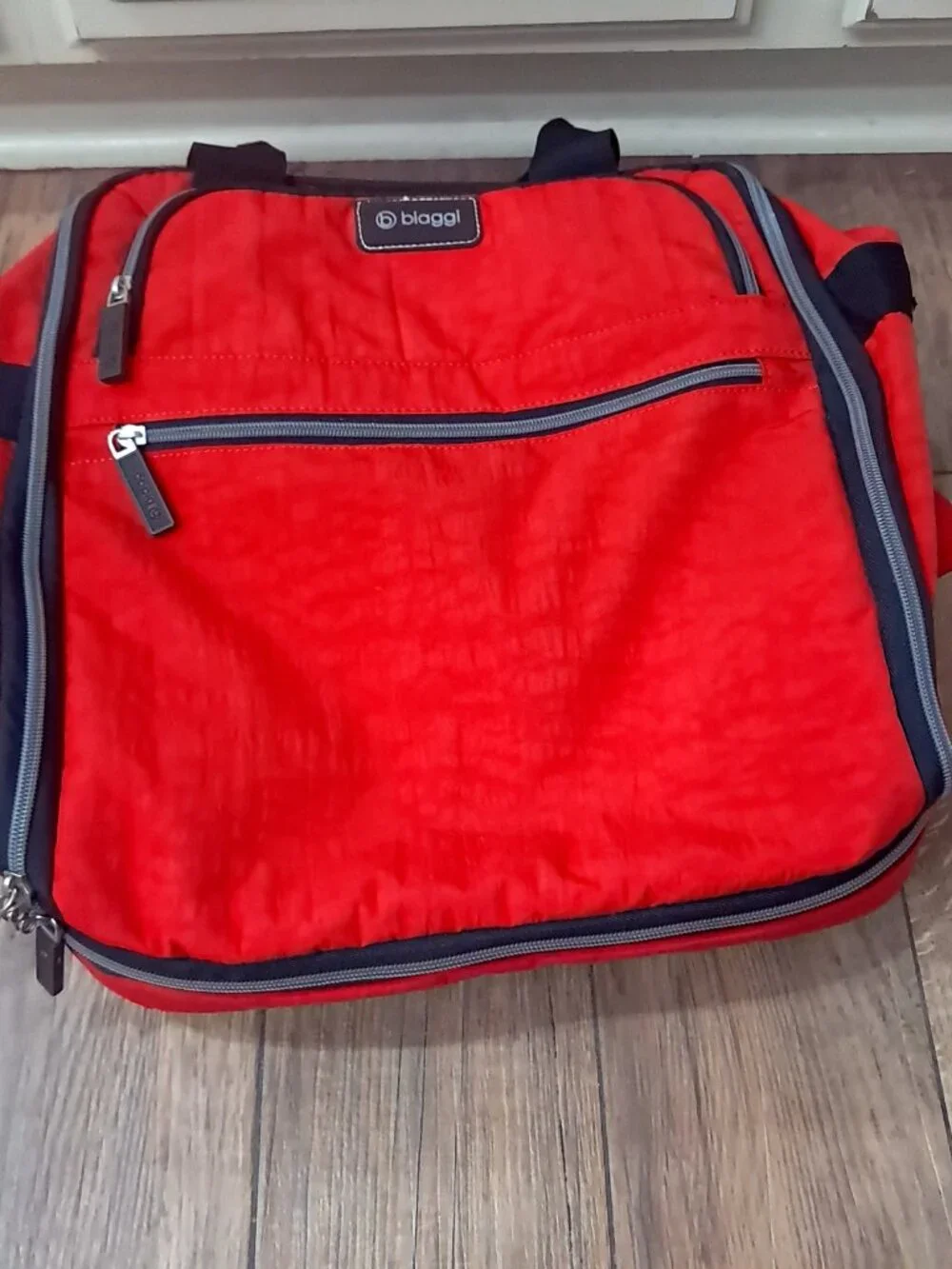 Biaggi Rolling Red Spinner Carry-On Duffle bag luggage foldable Microfold Zipsak